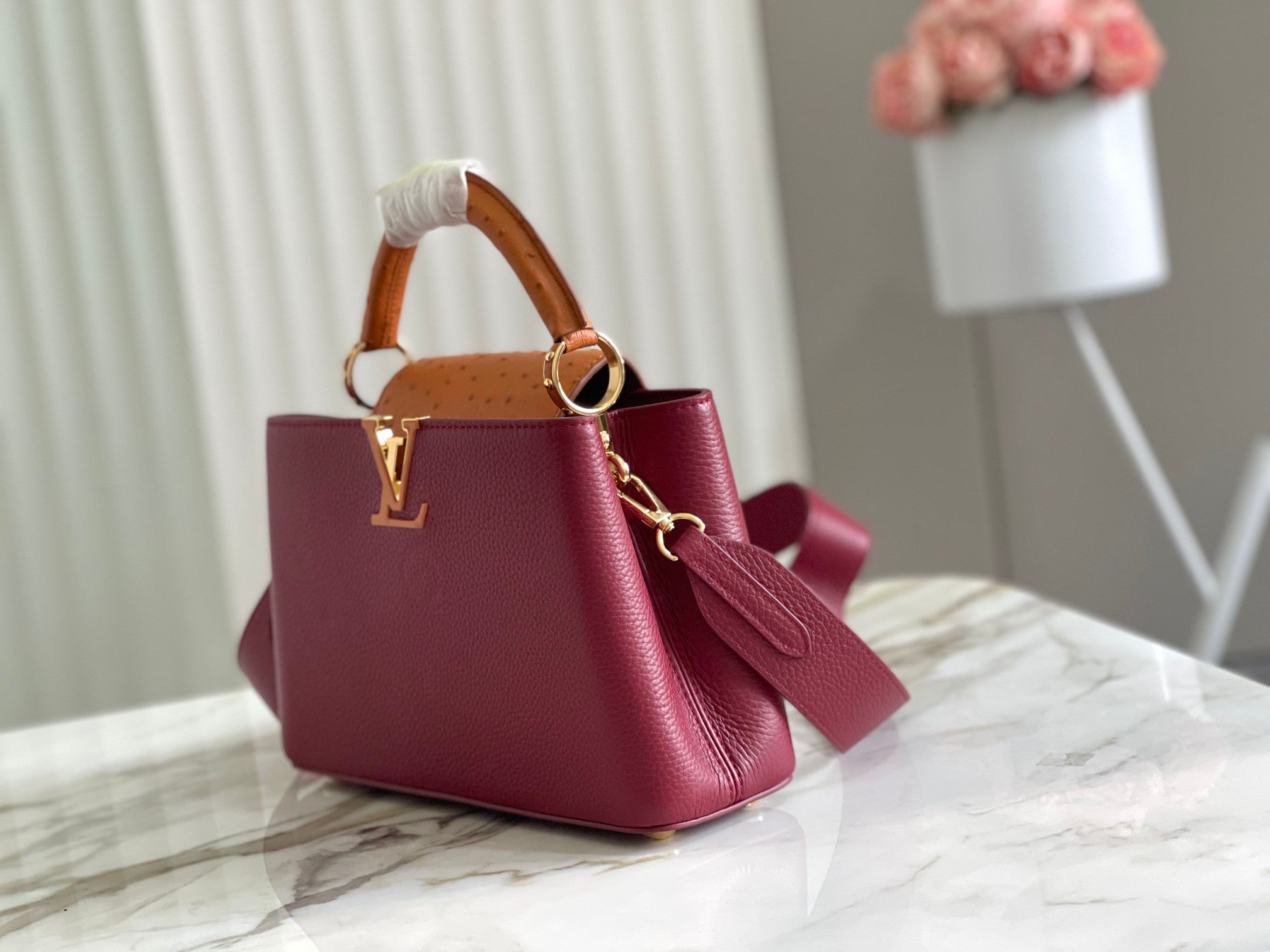 Capucines BB Handbag in Burgundy Ostrich Pattern