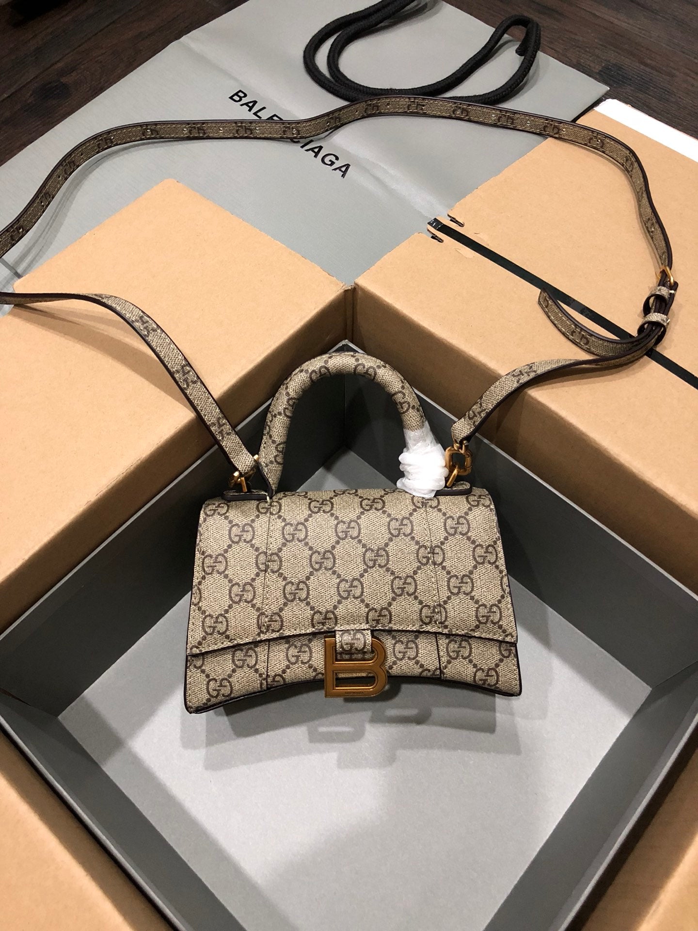 Elegant Co-Branded Hourglass Bag by Balenciaga