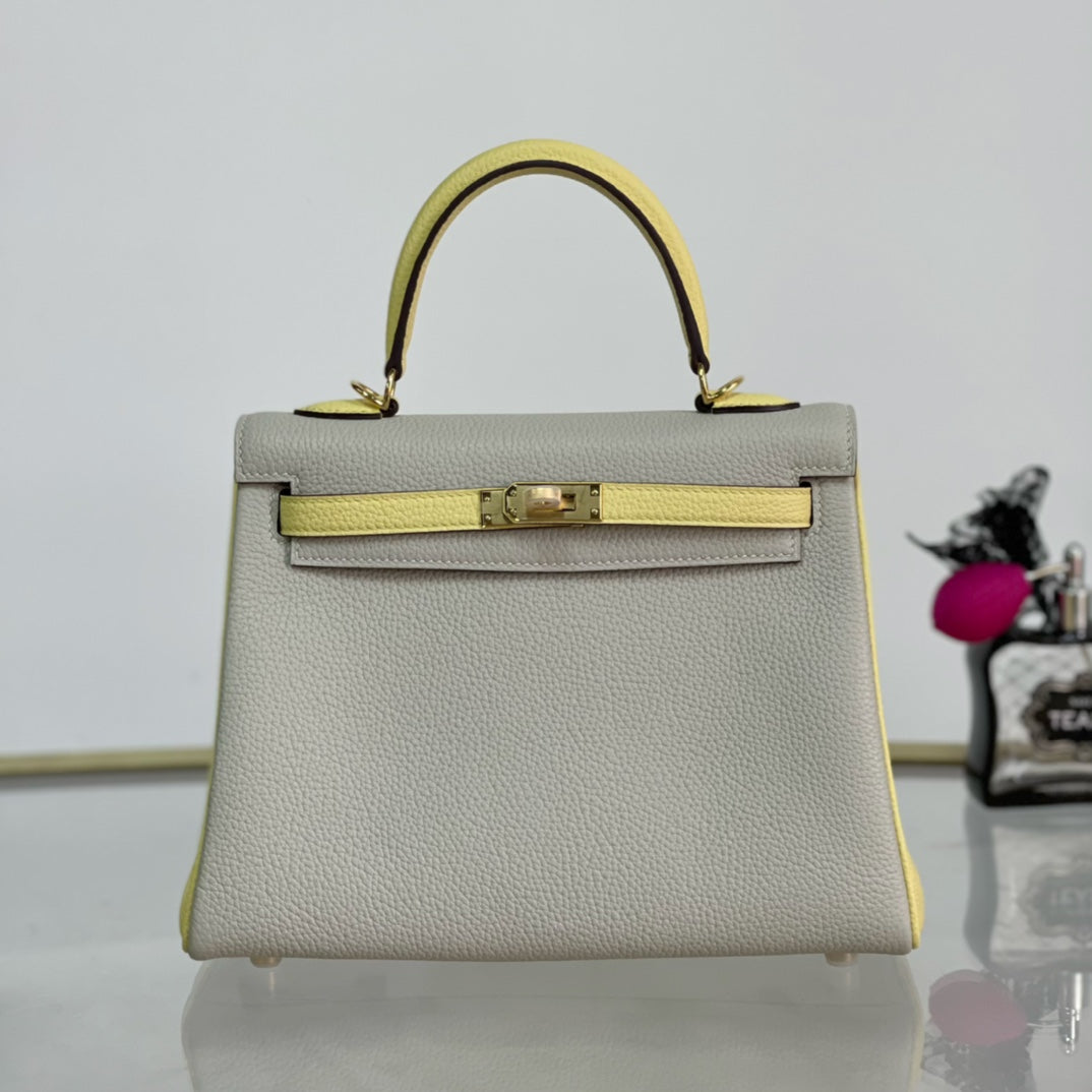 Kelly 25 Handbag in Pearl Gray, Chick Yellow, and Gold Buckle