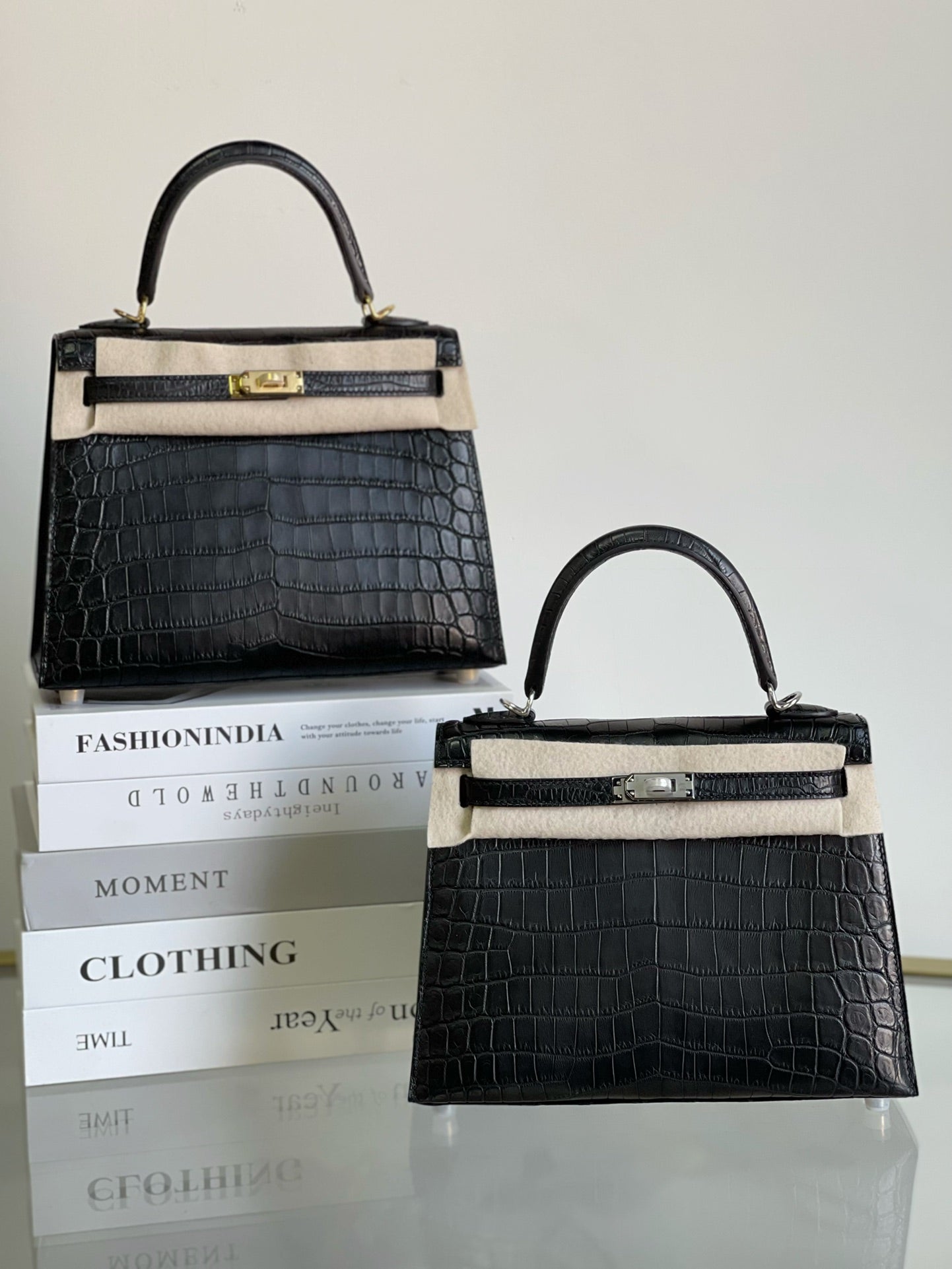 Kelly 25 Matte Nile Black Handbag with Gold and Silver Buckles