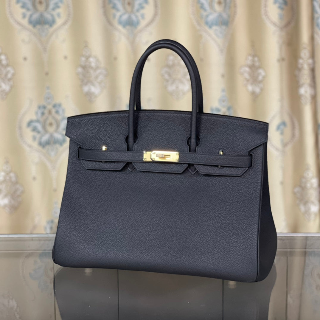 Platinum 35 Togo Leather Handbag - Black with Gold Buckle