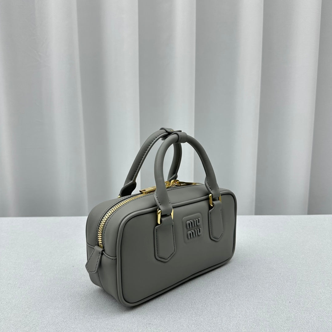 MIUMI SS23 Small Grey Soft Padded Bowling Bag