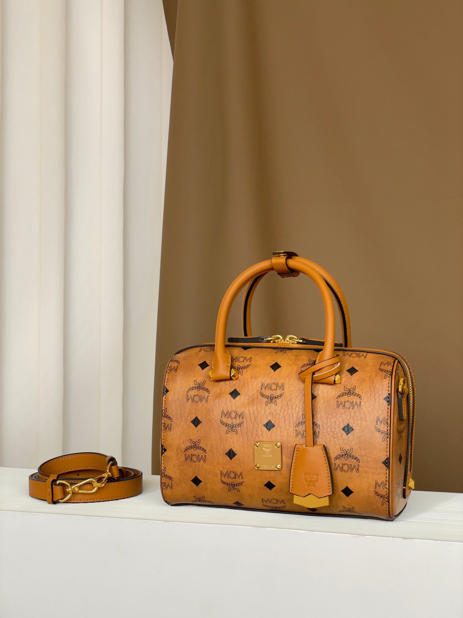 MCM Aren Visetos Small Boston Bag in Classic Cognac