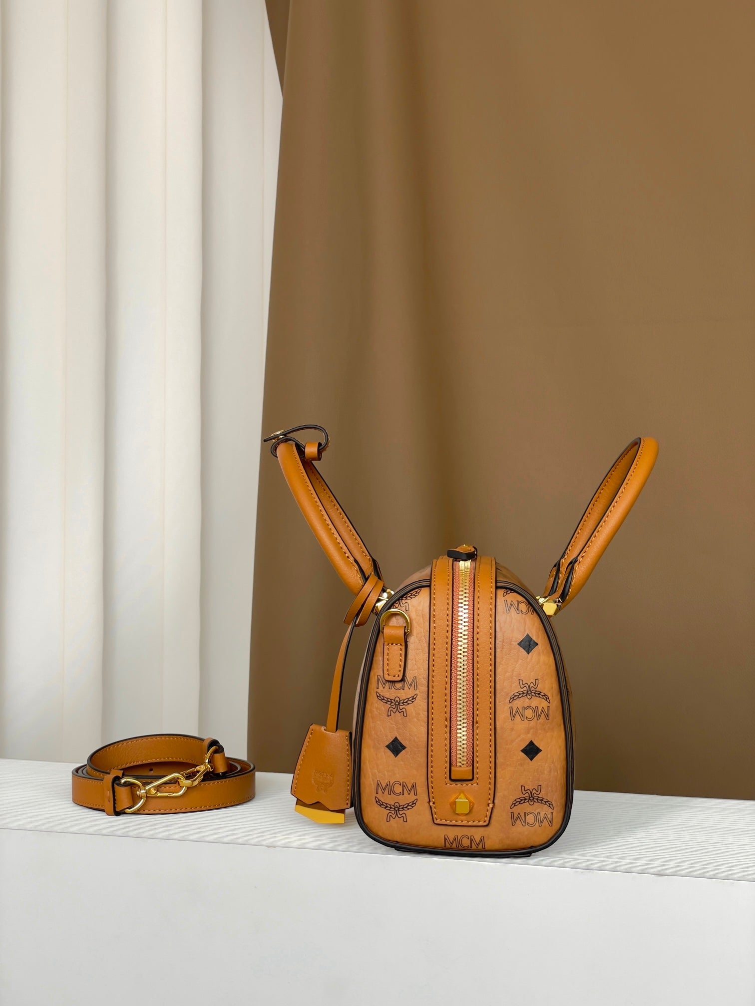 MCM Aren Visetos Small Boston Bag in Classic Cognac