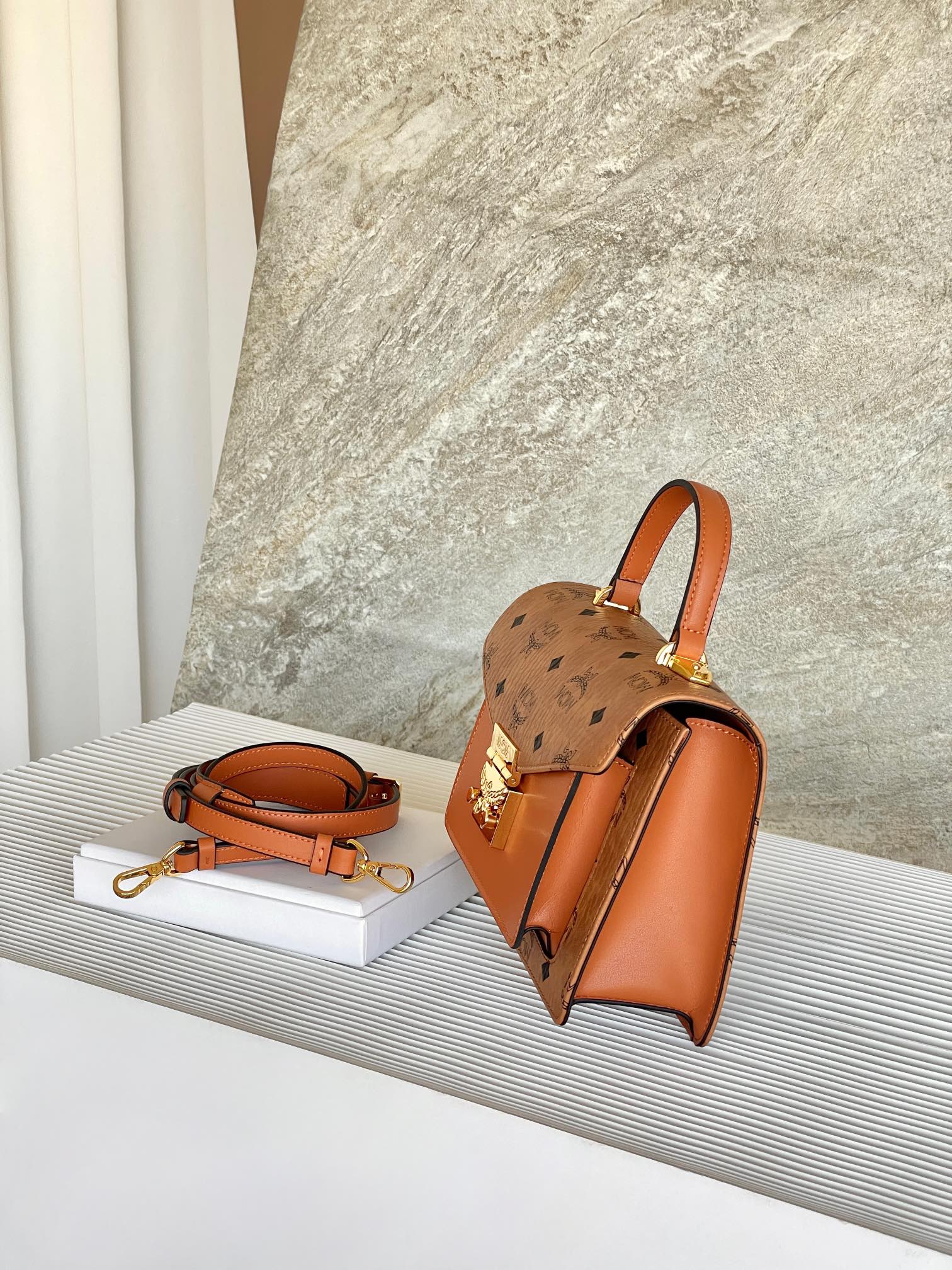 ** MCM Tracys Satchel - Classic Cognac Crossbody Bag

**