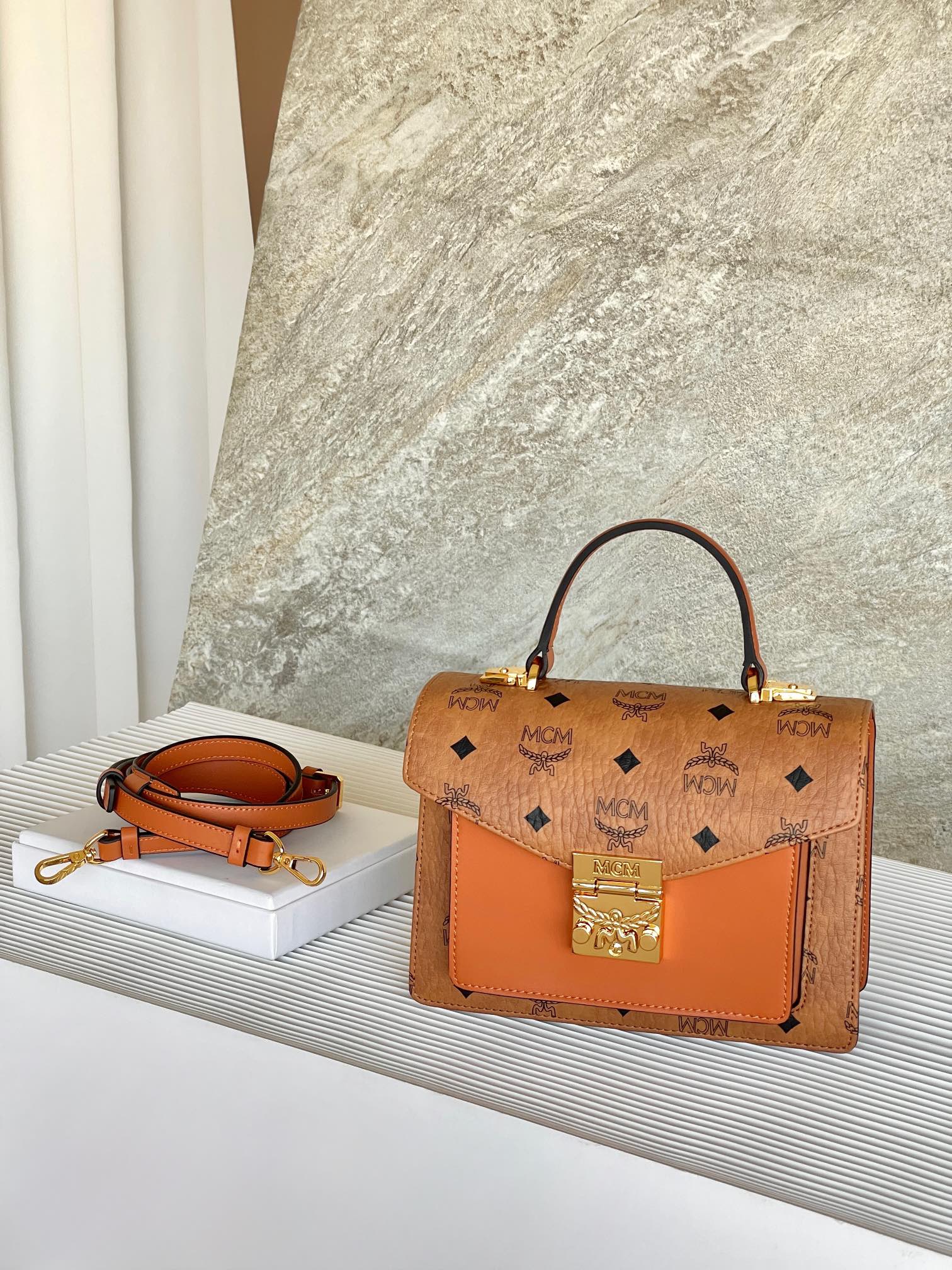 ** MCM Tracys Satchel - Classic Cognac Crossbody Bag

**