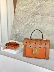 ** MCM Tracys Satchel - Classic Cognac Crossbody Bag

**