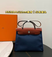 Hermes Herbag PM - Stylish Navy Blue Leather Bag with Red Brown Accents