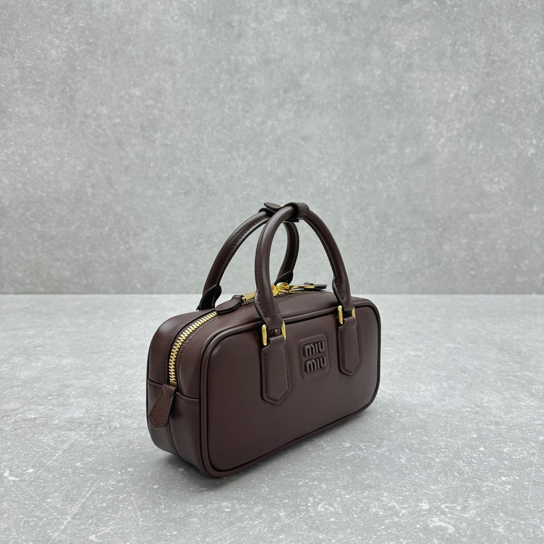 MIUMI SS23 Small Chocolate Bowling Bag - Stylish & Practical