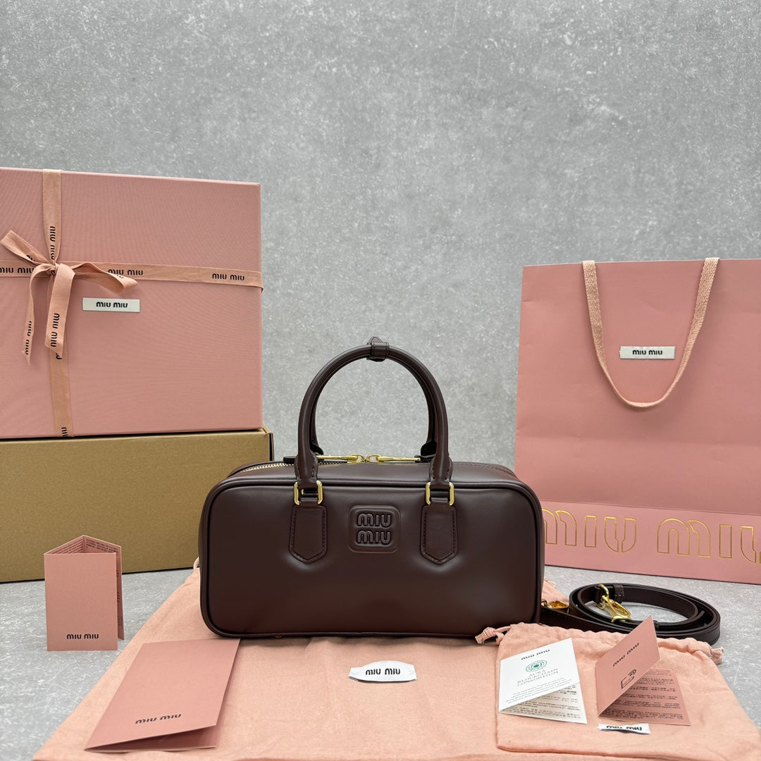 MIUMI SS23 Large Chocolate Soft Padded Bowling Bag