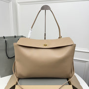 ** Balenciaga Rodeo Bag - Chic Milk Tea Color Handbag with Gold Buckle

**