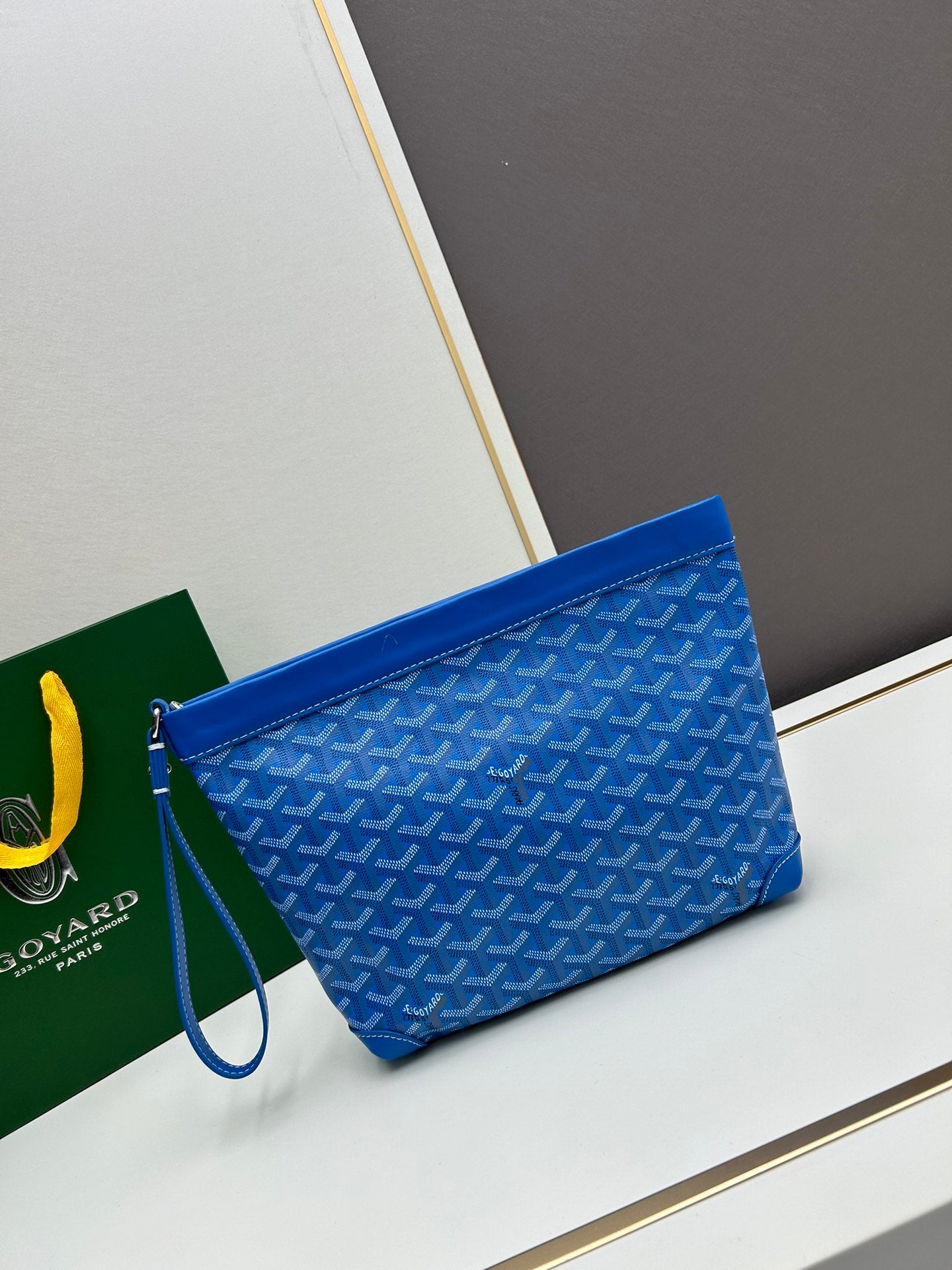 ** Goyard Conti Clutch Bag - Stylish & Practical Essentials

**