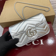 ** Gucci GG Marmont Super Mini Handbag - Silver Metallic Leather

**