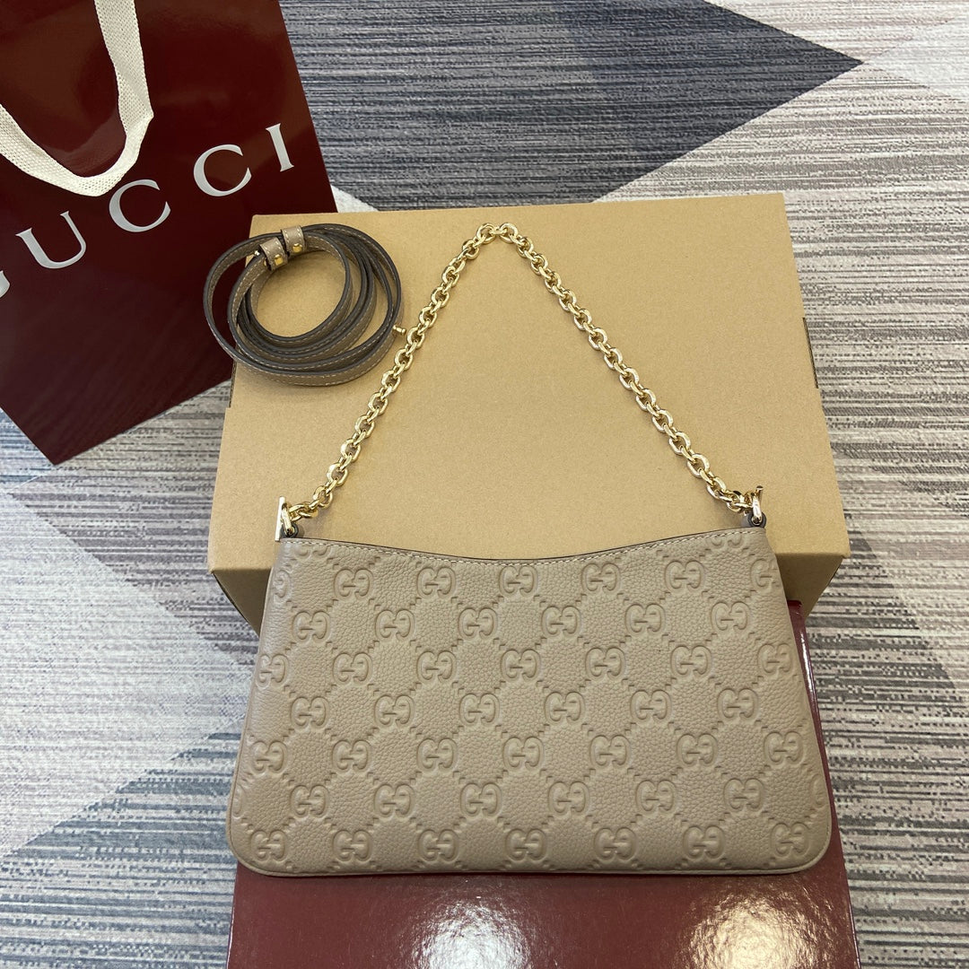 Gucci GG Emblem Small Shoulder Bag in Beige Grained Leather