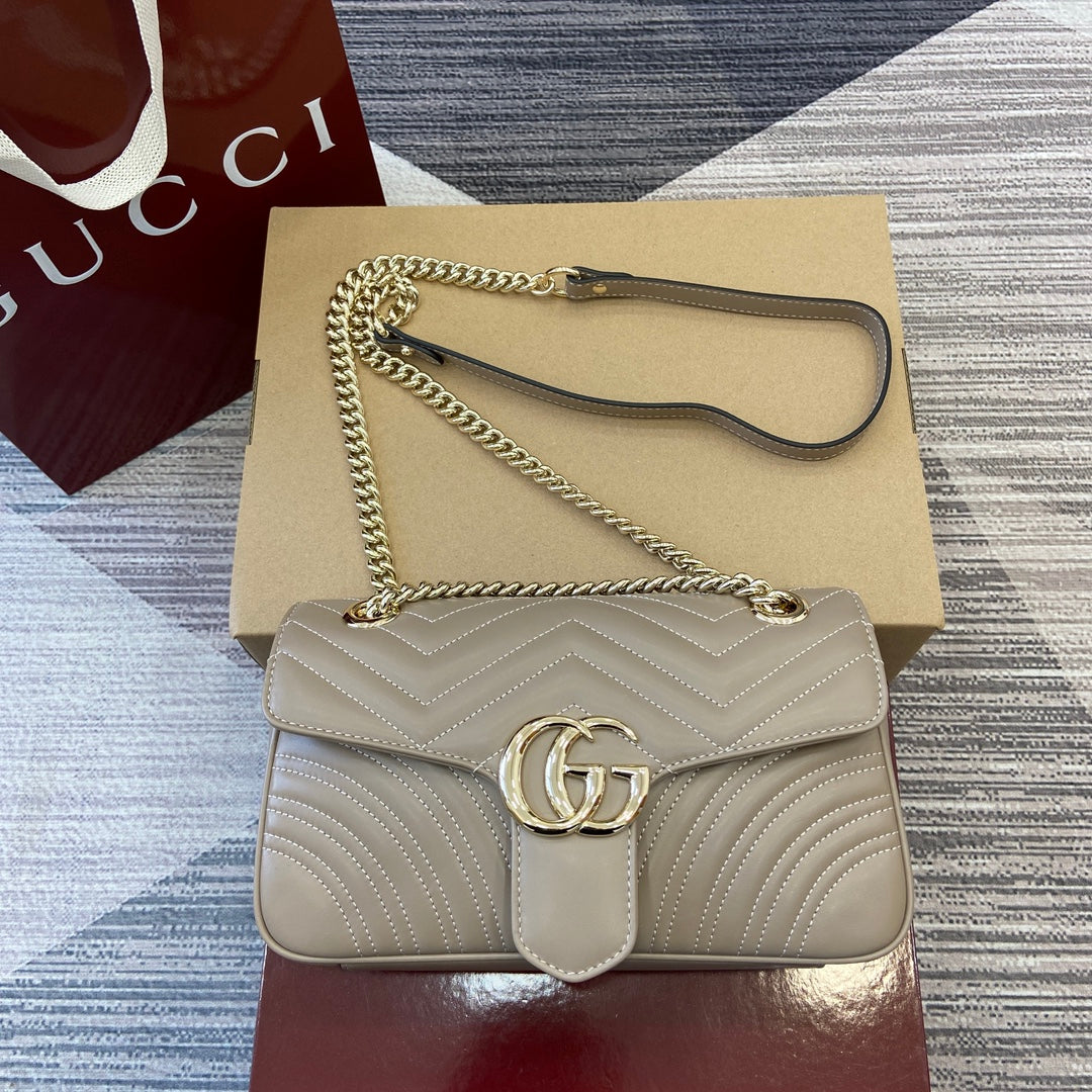 Gucci GG Marmont Mini Handbag in Beige Quilted Leather