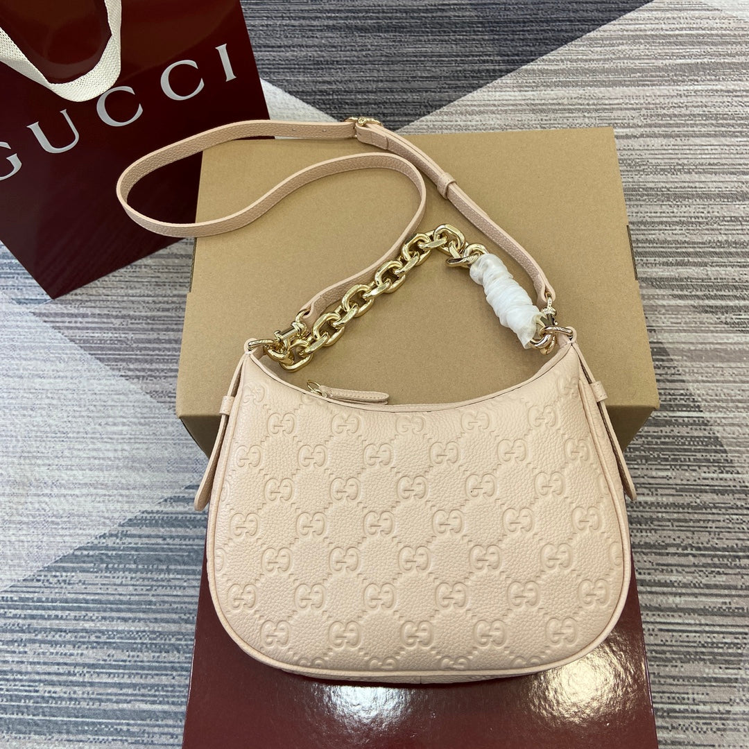 Gucci GG Emblem Medium Shoulder Bag in Pink Grained Leather