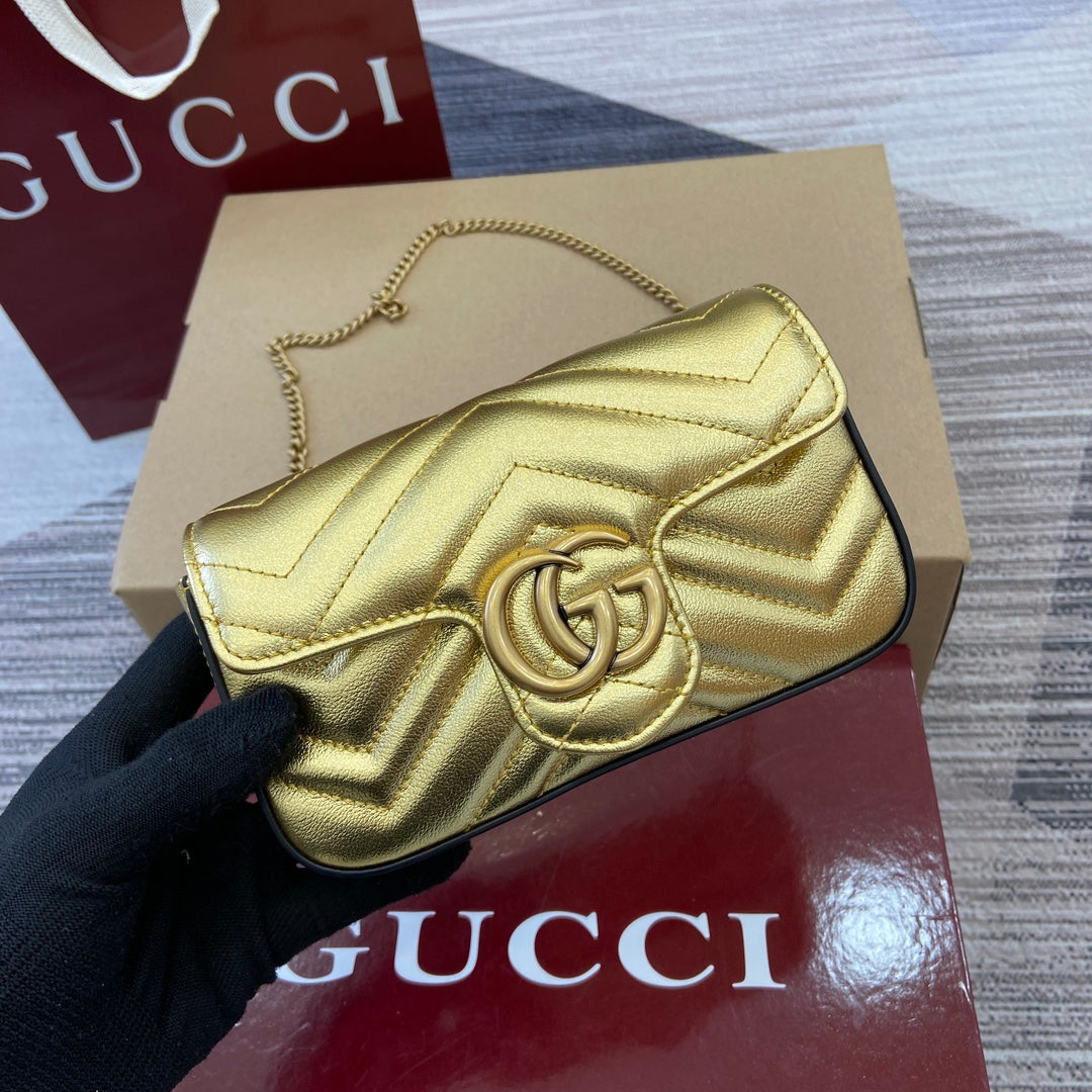 Gucci GG Marmont Ultra-Mini Handbag in Gold Metallic Leather