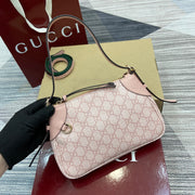 Gucci GG Emblem Small Shoulder Bag in Pink Leather