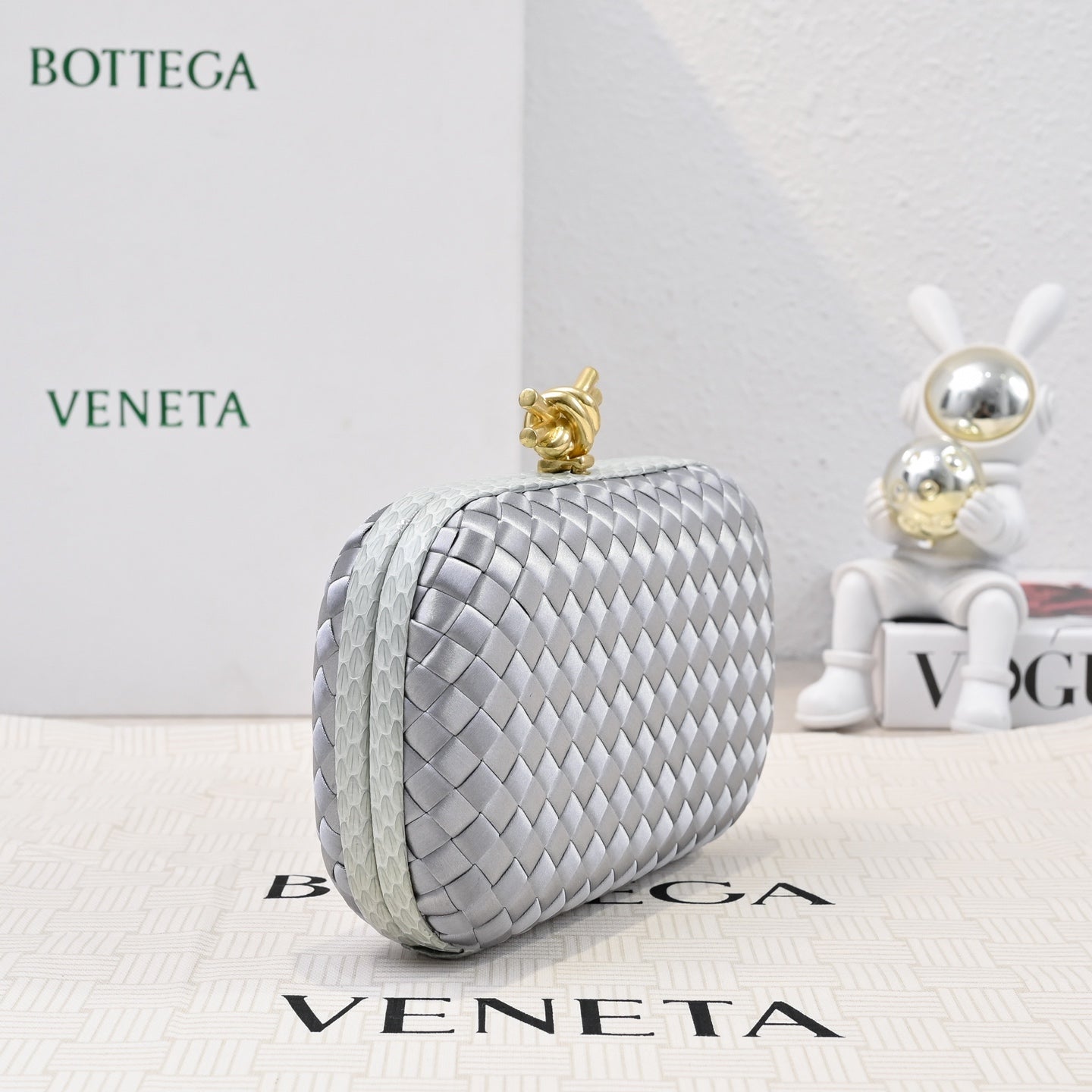 Elegant BV Knot Woven Evening Bag with Snake Skin Trim