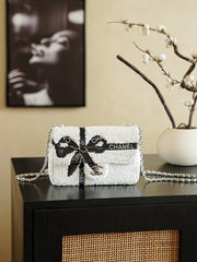 ChaneL 24B Bow Sequin Bag â€“ Luxurious Black & White Design